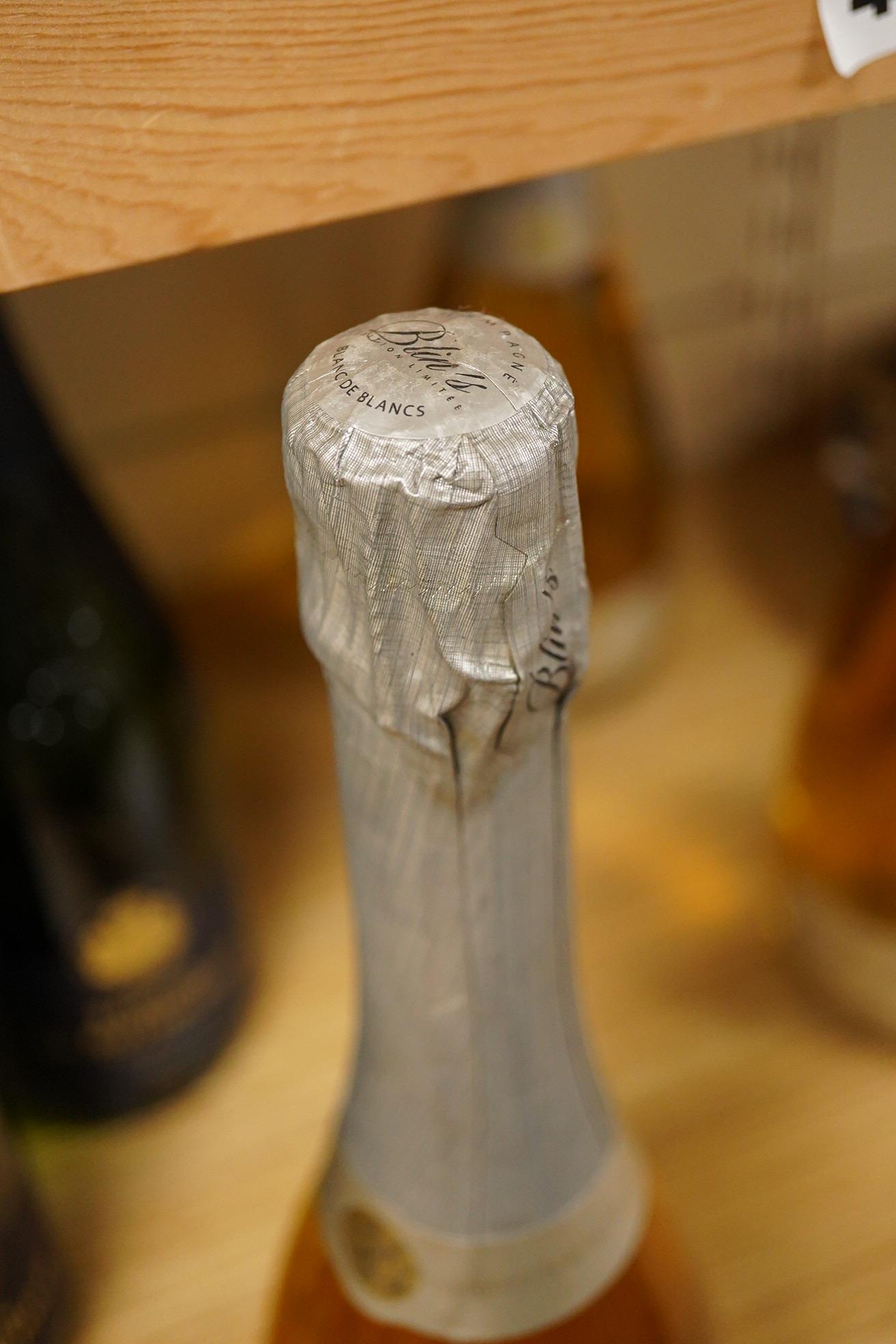 Three bottles of Barons de Rothschild NV Champagne and three bottles of Blin’s blanc de blanc Champagne.